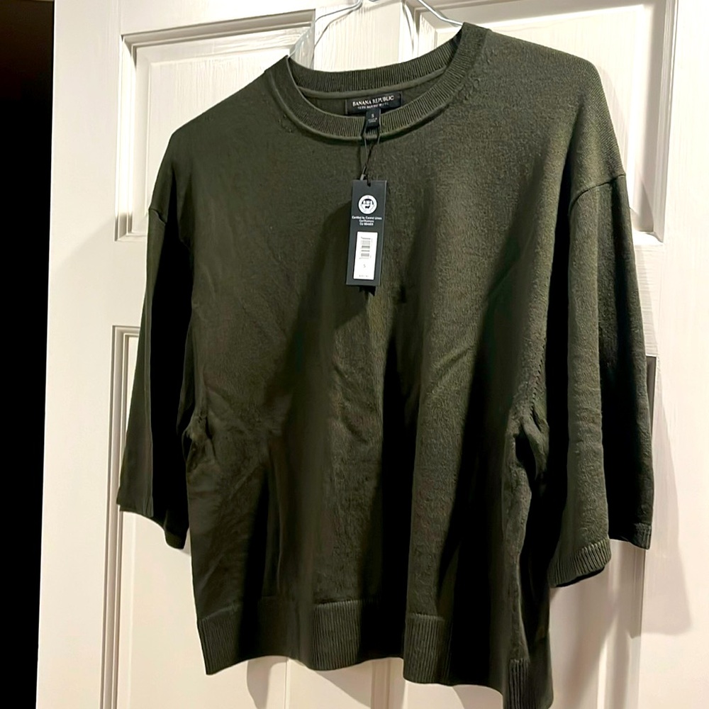 Olive green short wide sleeved merino wool sweater.
